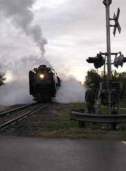 Train at rail crossing in Herington